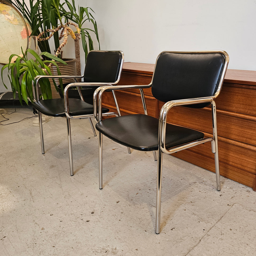 Pair of MCM Tubular Chrome & Black Vinyl Armchairs