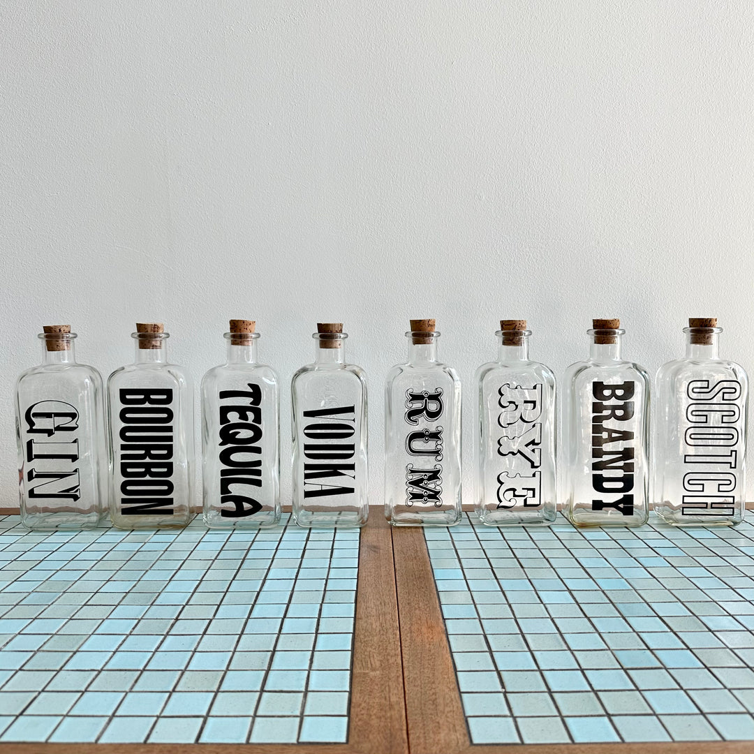 Lot of 8 Liquor Bottles, 1970's